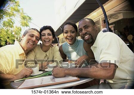 Picture - Portrait of two mature couples smiling. Fotosearch