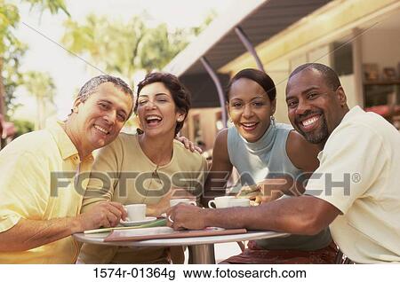 Portrait of two mature couples smiling View Large Photo Image Stock Image - Portrait of two mature couples smiling. Fotosearch