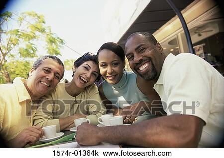 Portrait of two mature couples smiling View Large Photo Image Stock Image - Portrait of two mature couples smiling. Fotosearch