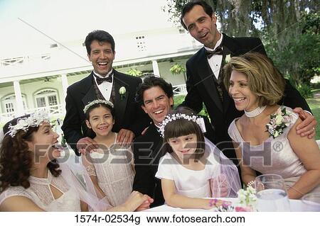 Portrait of wedding guests with a newlywed couple View Large Photo Image Stock Image - Portrait of wedding guests with a newlywed couple. Fotosearch