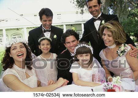 Portrait of wedding guests with a newlywed couple View Large Photo Image Stock Image - Portrait of wedding guests with a newlywed couple. Fotosearch