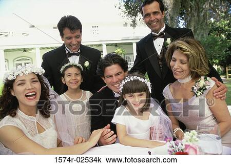 Portrait of wedding guests with a newlywed couple View Large Photo Image Stock Image - Portrait of wedding guests with a newlywed couple. Fotosearch