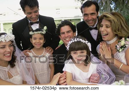 Portrait of wedding guests with a newlywed couple View Large Photo Image Stock Photography - Portrait of wedding guests with a newlywed couple. Fotosearch