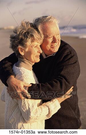 Stock Image - Senior couple embracing each other. Fotosearch