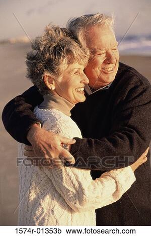 Stock Image - Senior couple embracing each other. Fotosearch