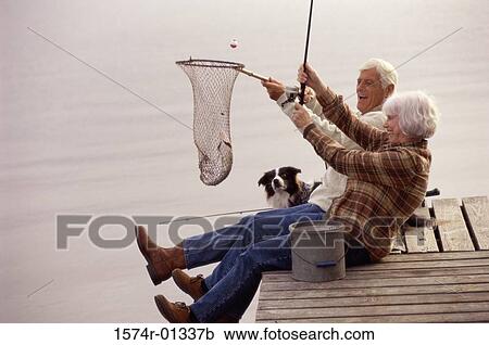 Side profile of a senior couple sitting on a pier fishing View Large Photo Image Stock Image - Side profile of a senior couple sitting on a pier fishing. Fotosearch