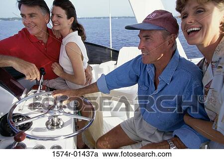 Side profile of two mature couples on a boat View Large Photo Image Stock Image - Side profile of two mature couples on a boat. Fotosearch