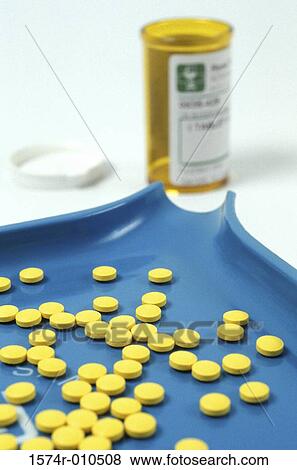Tablets on a tray View Large Photo Image Stock Photo - Tablets on a tray. Fotosearch