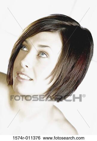 Young woman smiling View Large Photo Image Stock Photograph - Young woman smiling. Fotosearch