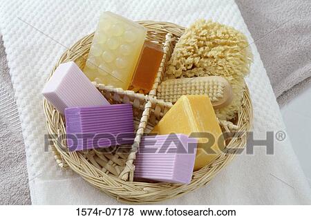Basket of soaps with a brush and sponge View Large Photo Image Stock Photo - Basket of soaps with a brush and sponge. Fotosearch