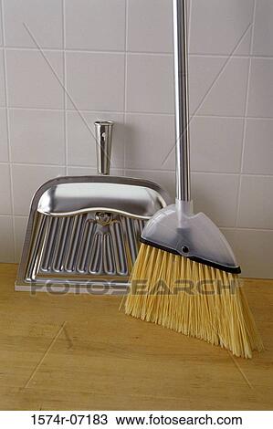 Stock Image - Broomstick and a pan. Fotosearch