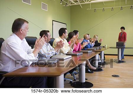 Business executives in a conference room View Large Photo Image Stock Image - Business executives in a conference room. Fotosearch