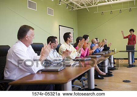 Business executives in a conference room View Large Photo Image Stock Image - Business executives in a conference room. Fotosearch