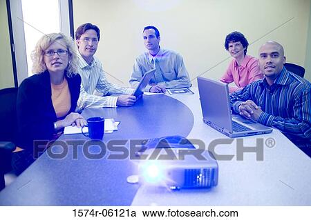 Business executives in a conference room View Large Photo Image Stock Image - Business executives in a conference room. Fotosearch