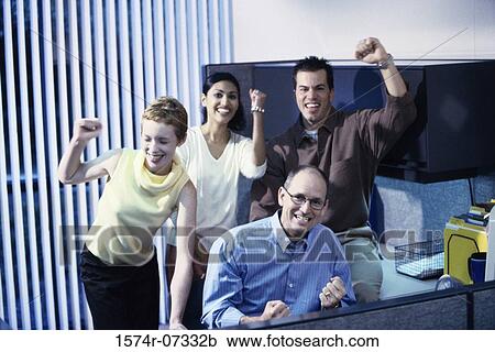 Stock Image - Business executives in an office. Fotosearch