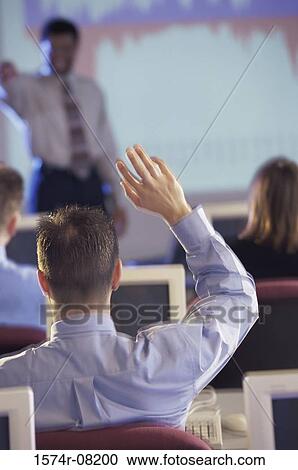 Businessman conducting a presentation View Large Photo Image Stock Image - Businessman conducting a presentation. Fotosearch