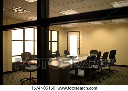 Chairs and a table in a boardroom View Large Photo Image Stock Image - Chairs and a table in a boardroom. Fotosearch