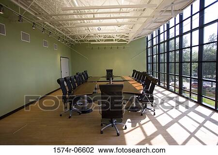 Chairs and a table in a boardroom View Large Photo Image Stock Image - Chairs and a table in a boardroom. Fotosearch