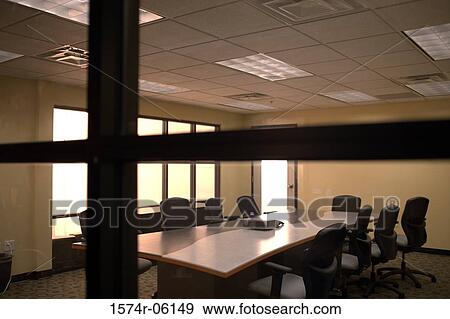 Chairs and a table in a boardroom View Large Photo Image Stock Photo - Chairs and a table in a boardroom. Fotosearch