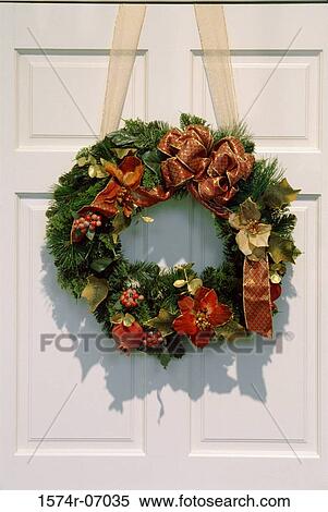 Christmas wreath on a door View Large Photo Image Stock Photography - Christmas wreath on a door. Fotosearch