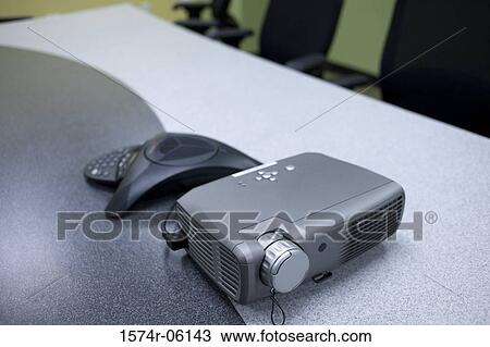 Close-up of a conference phone and projection equipment in an office View Large Photo Image Stock Image - Close-up of a conference phone and projection equipment in an office. Fotosearch