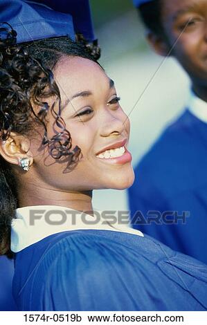 Close-up of a female graduate smiling View Large Photo Image Stock Image - Close-up of a female graduate smiling. Fotosearch