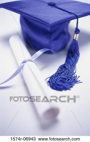 Close-up of a mortarboard and a diploma View Large Photo Image Stock Image - Close-up of a mortarboard and a diploma. Fotosearch