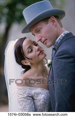 Stock Image - Close-up of a newlywed couple. Fotosearch