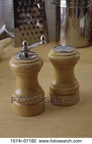 Close-up of a pepper mill and a salt shaker View Large Photo Image Stock Image - Close-up of a pepper mill and a salt shaker. Fotosearch
