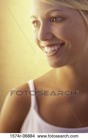 Picture - Close-up of a teenage girl smiling. Fotosearch