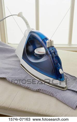 Stock Image - Close-up of an electric iron. Fotosearch