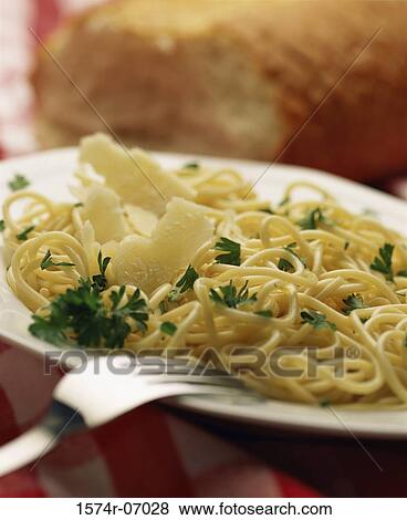 Close-up of spaghetti in a plate View Large Photo Image Stock Photo - Close-up of spaghetti in a plate. Fotosearch