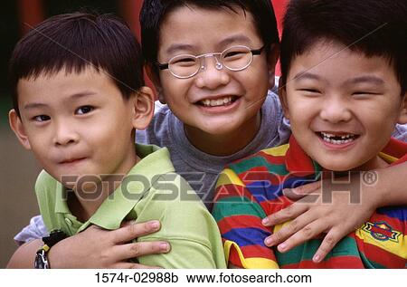 Close-up of three boys smiling View Large Photo Image Stock Image - Close-up of three boys smiling. Fotosearch