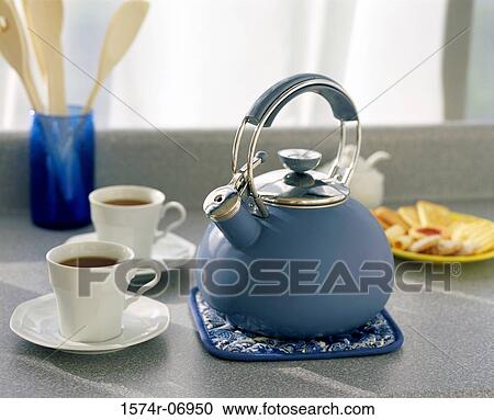 Close-up of two coffee cups and a kettle View Large Photo Image Stock Image - Close-up of two coffee cups and a kettle. Fotosearch