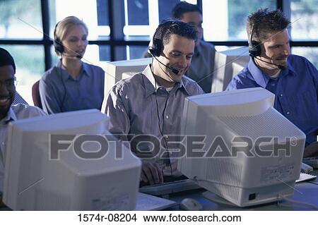 Picture - Customer service representatives working. Fotosearch
