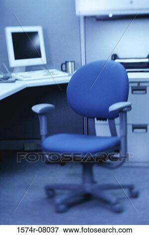 Empty chair in an office View Large Photo Image Stock Photo - Empty chair in an office. Fotosearch