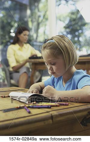 Girl reading a book View Large Photo Image Stock Image - Girl reading a book. Fotosearch