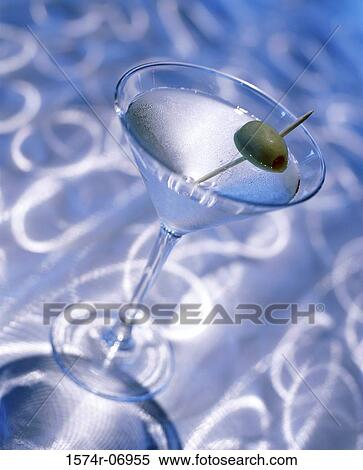 Green olive in a martini glass View Large Photo Image Stock Photography - Green olive in a martini glass. Fotosearch