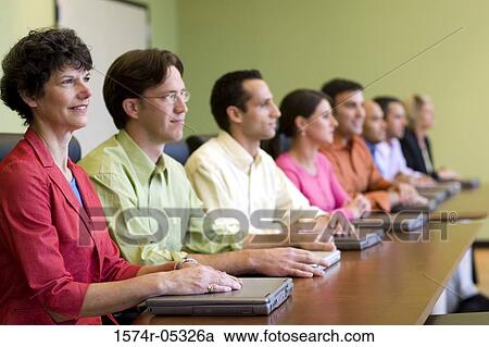 Group of business executives in a meeting View Large Photo Image Stock Image - Group of business executives in a meeting. Fotosearch