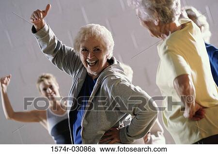 Group of senior women exercising in a health club View Large Photo Image Stock Image - Group of senior women exercising in a health club. Fotosearch