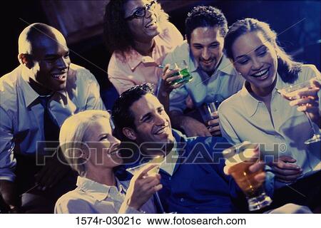 Group of young people in a bar View Large Photo Image Stock Image - Group of young people in a bar. Fotosearch