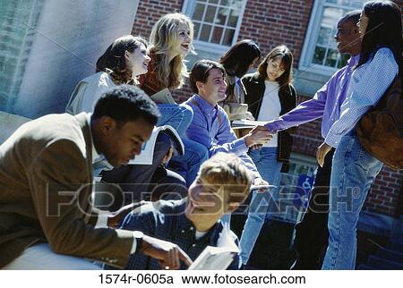 Group of young people together View Large Photo Image Stock Image - Group of young people together. Fotosearch