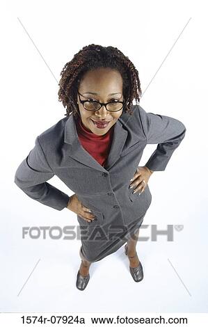 Stock Image - High angle view of a businesswoman smiling. Fotosearch