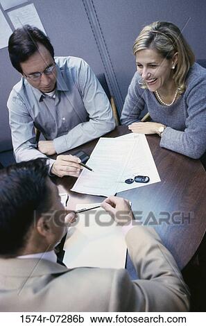 High angle view of business executives in a meeting View Large Photo Image Stock Image - High angle view of business executives in a meeting. Fotosearch