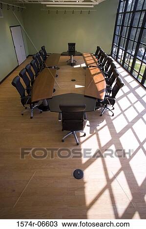 High angle view of chairs and a table in a boardroom View Large Photo Image Stock Image - High angle view of chairs and a table in a boardroom. Fotosearch
