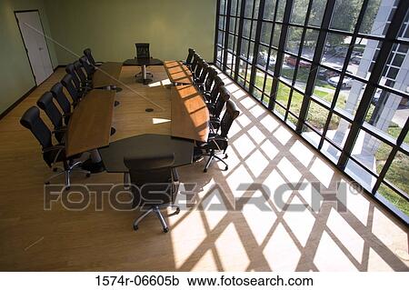 High angle view of chairs and a table in a boardroom View Large Photo Image Stock Image - High angle view of chairs and a table in a boardroom. Fotosearch