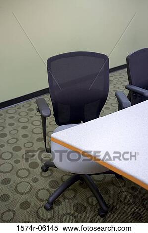 High angle view of two chairs and a table in a boardroom View Large Photo Image Stock Photography - High angle view of two chairs and a table in a boardroom. Fotosearch