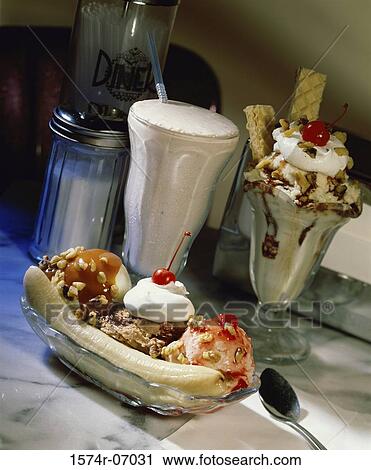 Stock Image - Ice cream float with a banana split and milkshake. Fotosearch