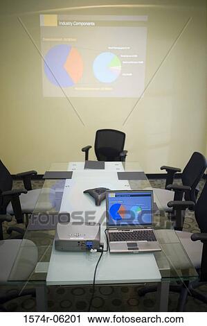 Laptop and projection equipment in a conference room View Large Photo Image Stock Image - Laptop and projection equipment in a conference room. Fotosearch