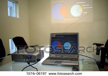Laptop and projection equipment in a conference room View Large Photo Image Stock Photo - Laptop and projection equipment in a conference room. Fotosearch